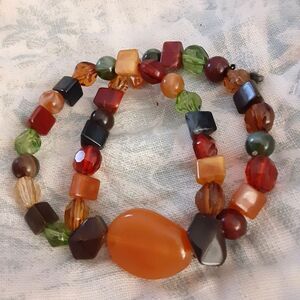 Double strand muted tone acrylic beaded stretch bracelets